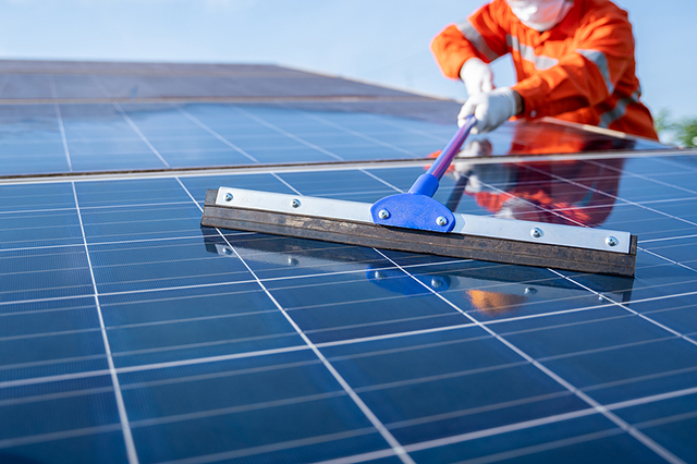 Solar panels being cleaned